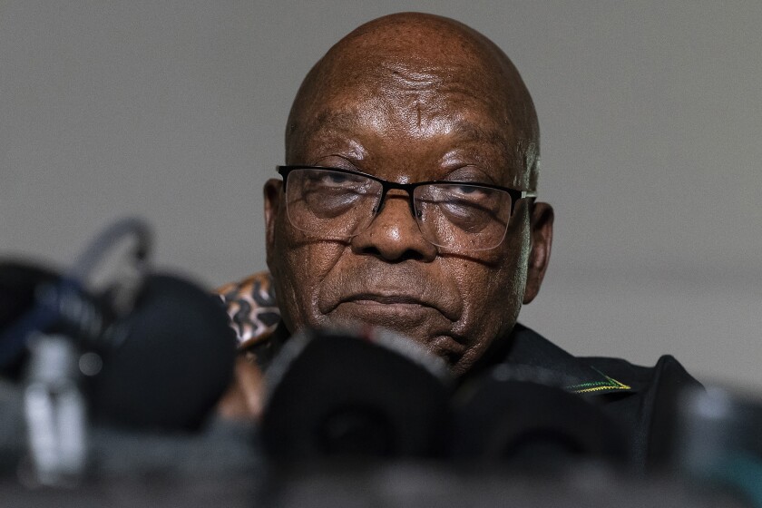 FILE - In this Sunday, July 4, 2021 file photo, former President Jacob Zuma addresses the press at his home in Nkandla, KwaZulu-Natal Province, South Africa. Zuma left his home to hand himself over to authorities to serve a 15-month prison term Wednesday, July 7, 2021. (AP Photo/Shiraaz Mohamed, File)