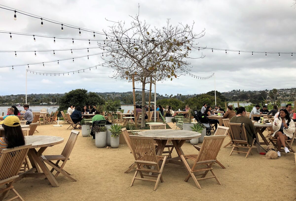 The outdoor patio at Superbloom Cafe overlooks Mission Bay in San Diego.