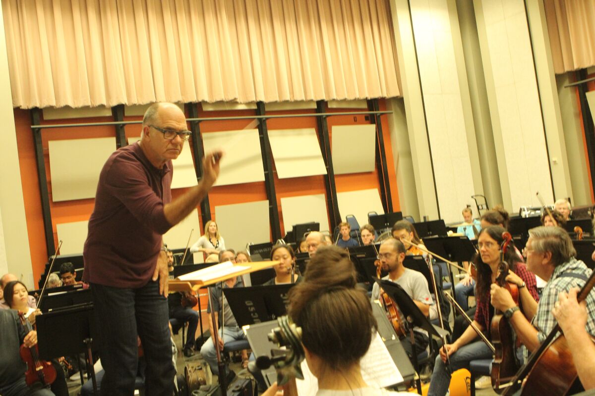 Music director Steven Schick conducts the ensemble through Bartok's 'Concerto for Orchestra' during the first rehearsal of its 65th season.