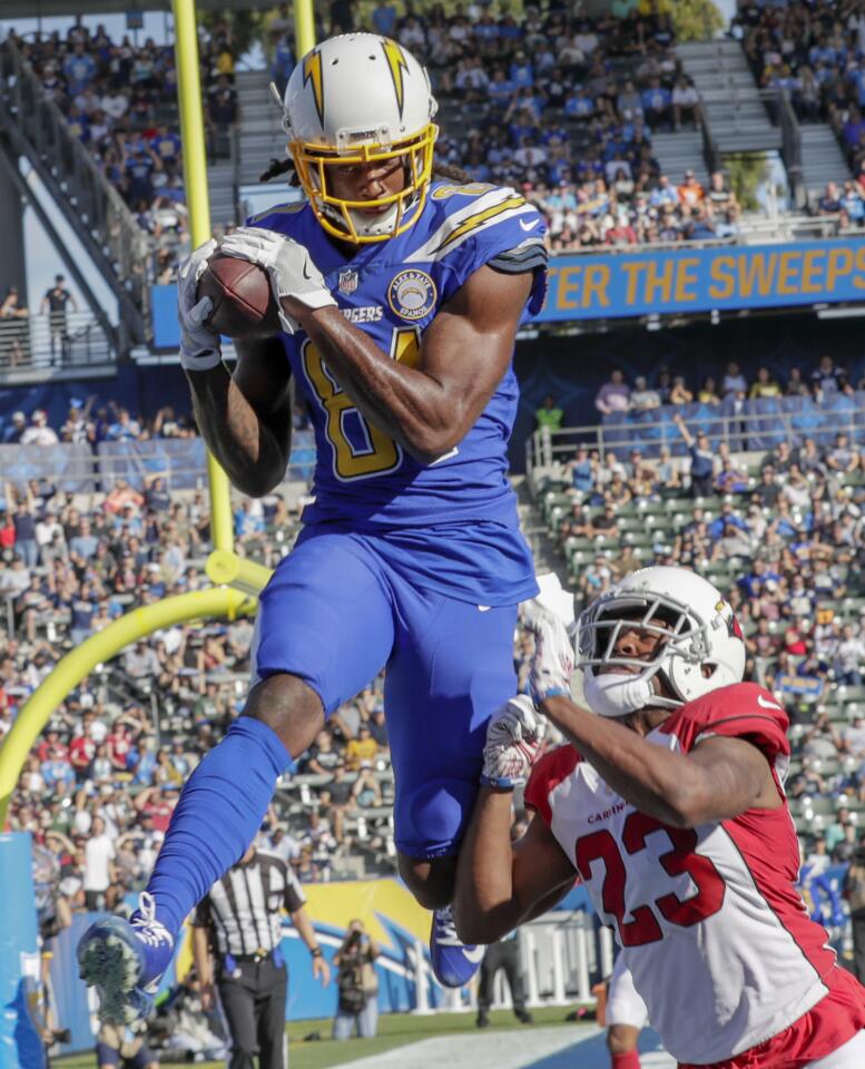 Chargers receiver Mike Williams hauls in a second quarter touchdown pass over Arizona Cardinals cornerback Bené Benikere at StubHub Center.