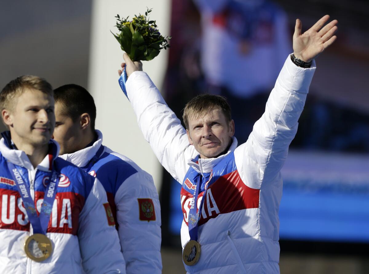 Alexander Zubkov, right, won a gold medal in the Sochi Winter Olympics.