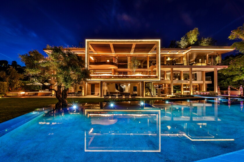 The 25,000-square-foot showplace in Bel-Air, featuring 20,000 square feet of decking/patios and a vertical garage, sold in July for $75 million, or $13 million less than the asking price.