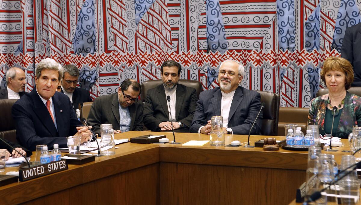 U.S. Secretary of State John F. Kerry and Iranian Foreign Minister Mohammad Javad Zarif at the 68th session of the United Nations General Assembly in New York.