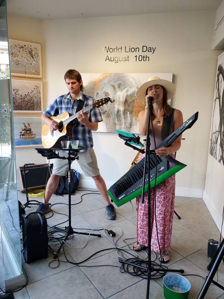 Musicians perform as part of the First Friday Art Walk in La Jolla on Aug. 5.