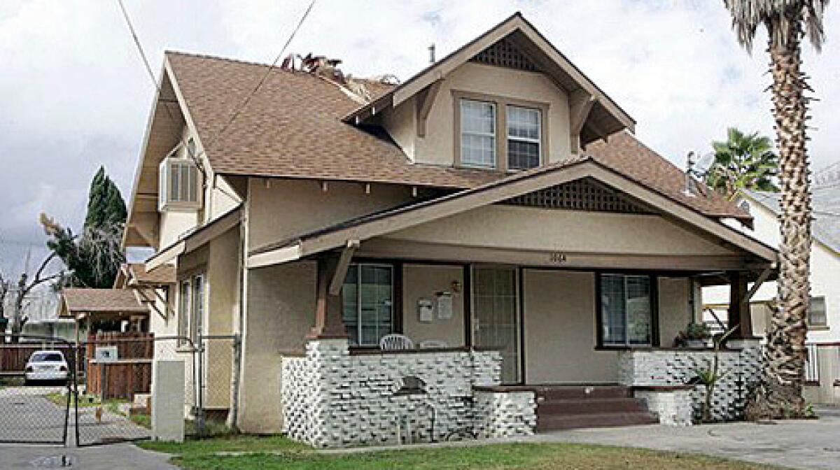 At 1064 N. D St. in San Bernardino, a home in the Dollar Homes program has had three owners. The city sold it for $6,000 to California Capital Properties, which then sold it to a buyer for $97,000. That buyer refinanced twice, ending up with a $280,500 loan.