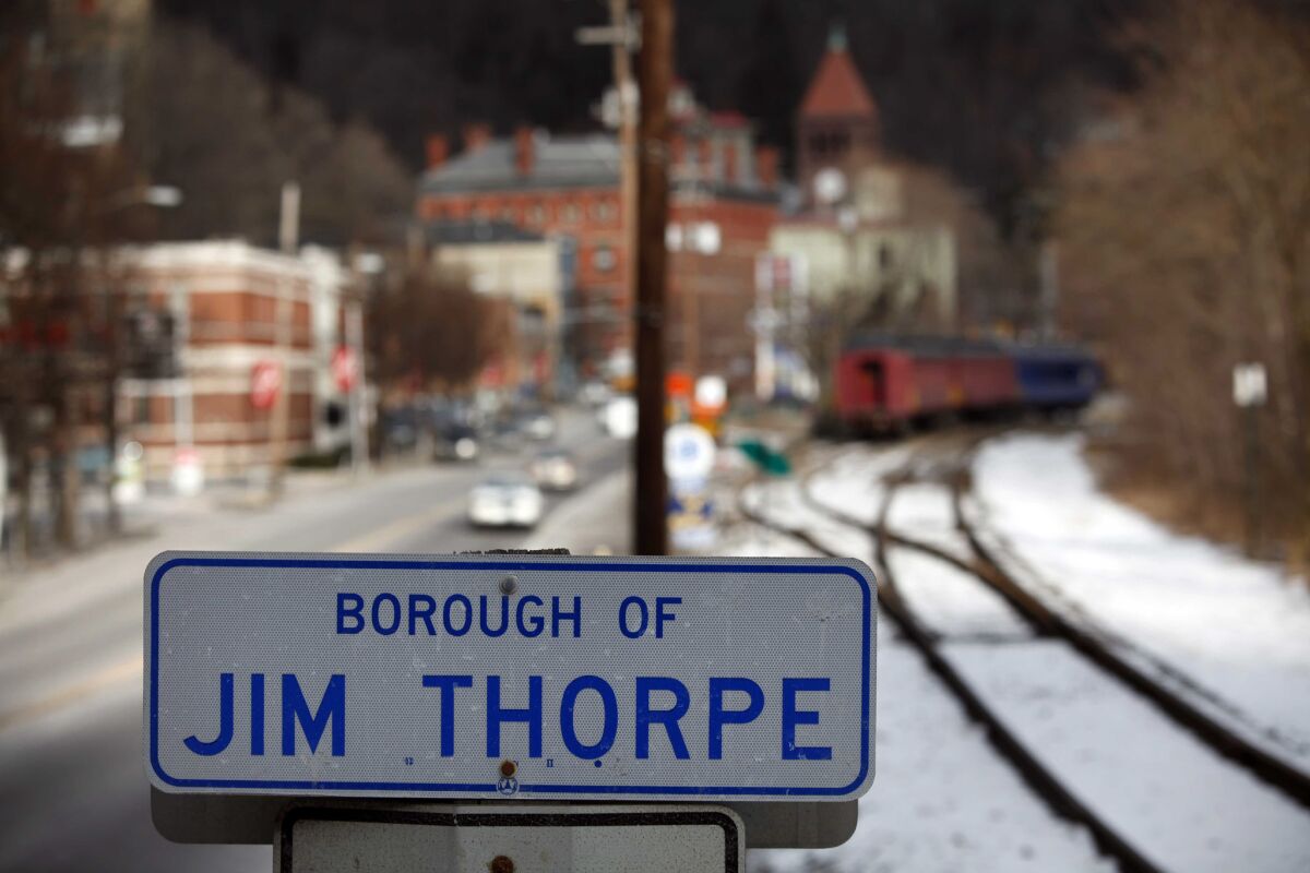 Two grandsons of Jim Thorpe side with the town. "This town was built around my grandpa -- people revere him," says one.