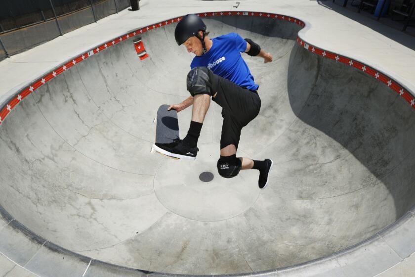 Famed professional skateboarder Tony Hawk turns 50 years old on May 12th, shown here doing a trick he invented called a Madonna at the Magdalena Ecke Family YMCA Skate Park in Encinitas on May 10, 2018. This is one of the tricks he performed for the new video 50 Tricks at 50. (Photo by K.C. Alfred/ San Diego Union -Tribune)