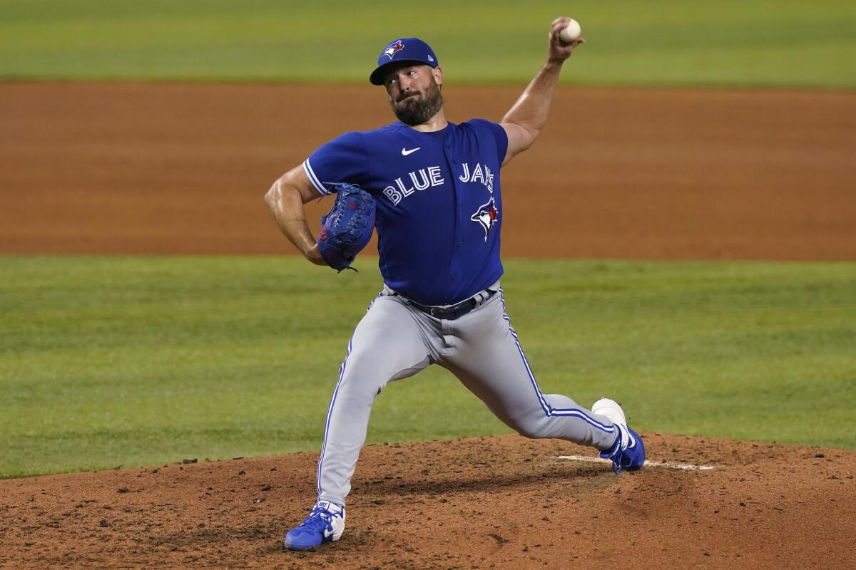 Ray helps Blue Jays win 4th straight by beating Marlins 3-1 - The