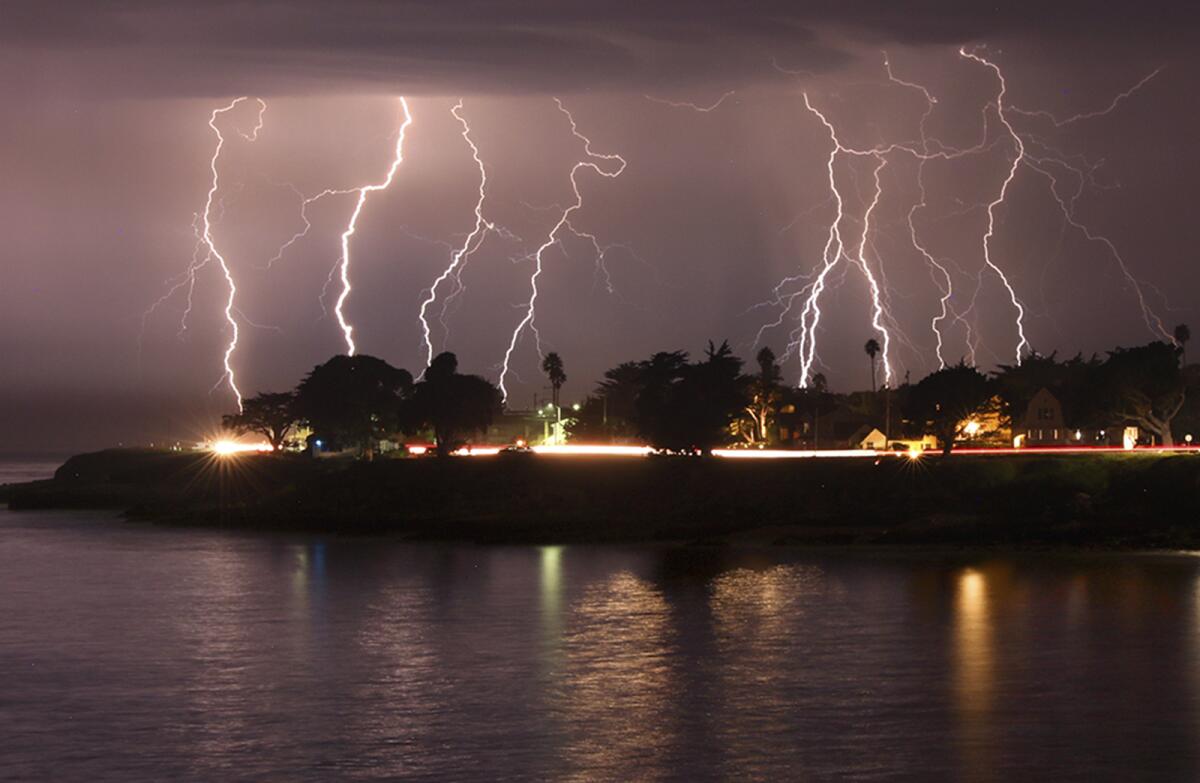 A rare lightning storm crackles over Mitchell's Cove in Santa Cruz, Calif., on Aug. 16.