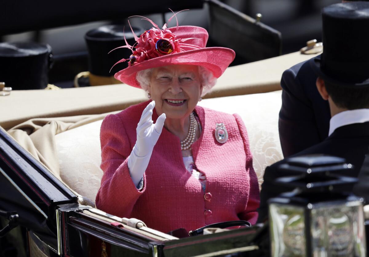 FILE - Britain's Queen Elizabeth II arrives on the third day of the Royal Ascot horse race meeting, which is traditionally known as Ladies Day, in Ascot, England, Thursday, June 21, 2018. Horse racing was Queen Elizabeth II's big sporting love. She first rode a horse at the age of 3 and would inherit the breeding and racing stock of her father, King George VI, when she acceded to the throne in 1952. (AP Photo/Tim Ireland. File)