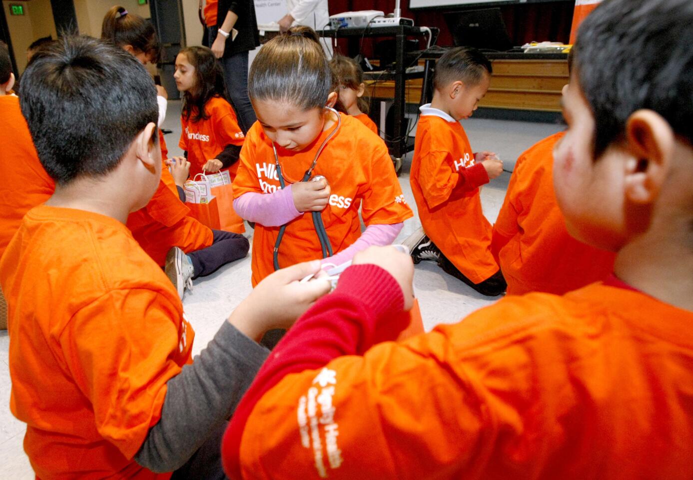 Photo Gallery: Dr. Antonio Zamorano holds annual Teddy Clinic at Cerritos Elementary School