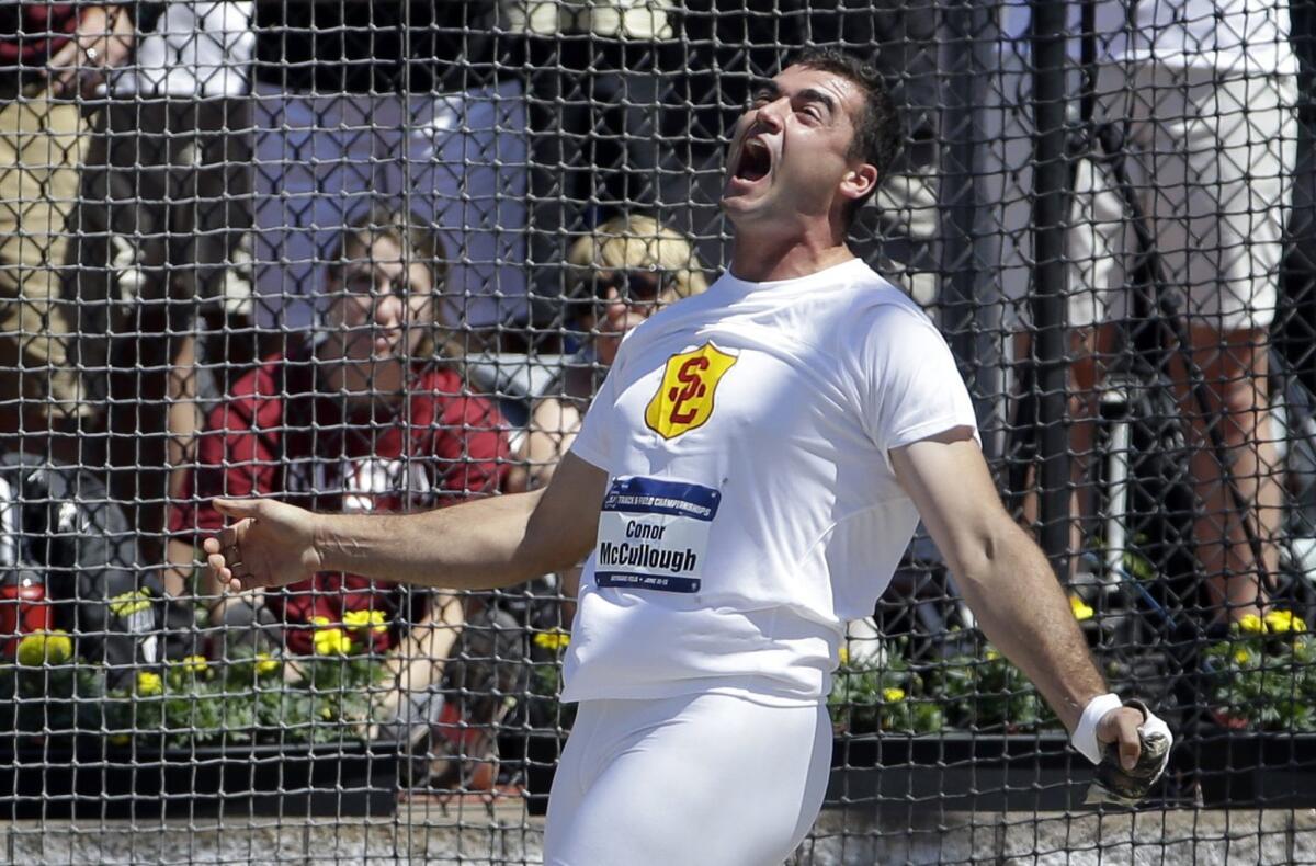 USC's Conor McCullough reacts after a throw in the hammer competition during the NCAA track and field championships in Eugene, Ore.