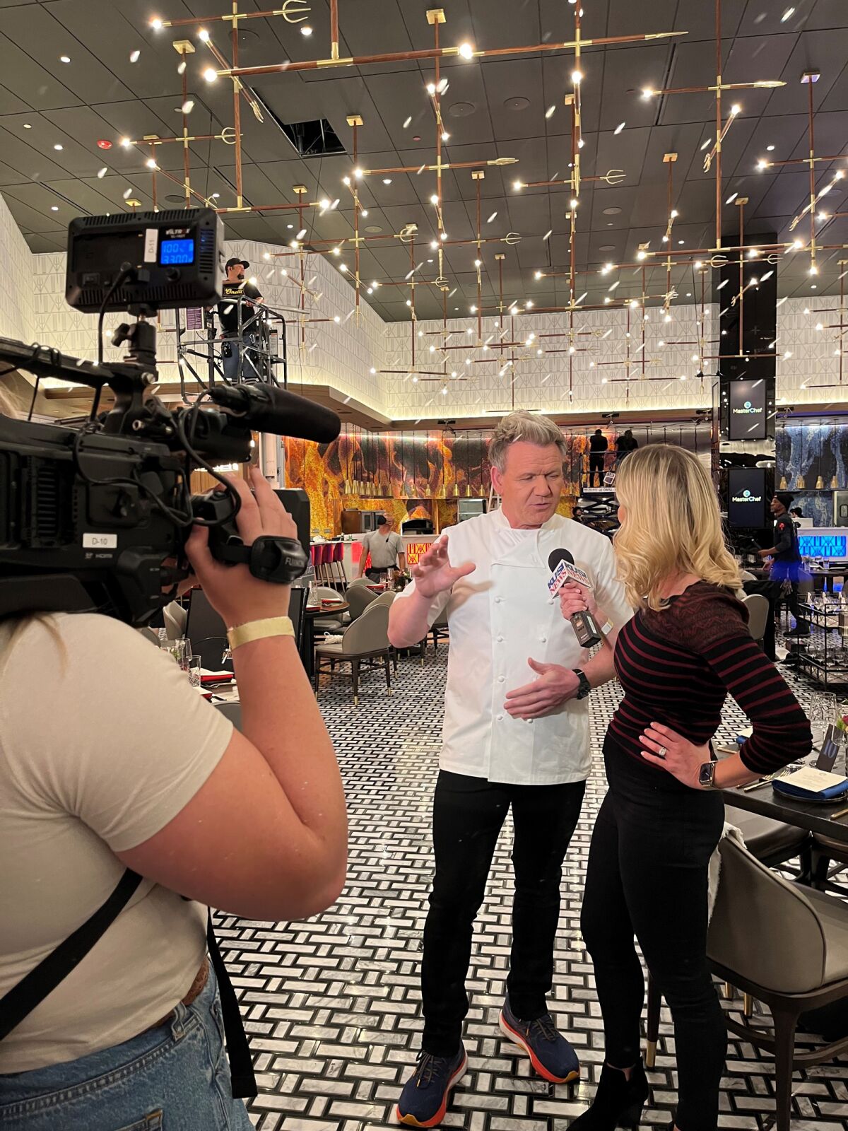 British chef Gordon Ramsay is interviewed by KUSI reporter Allie Wagner on Feb. 15, 2023.