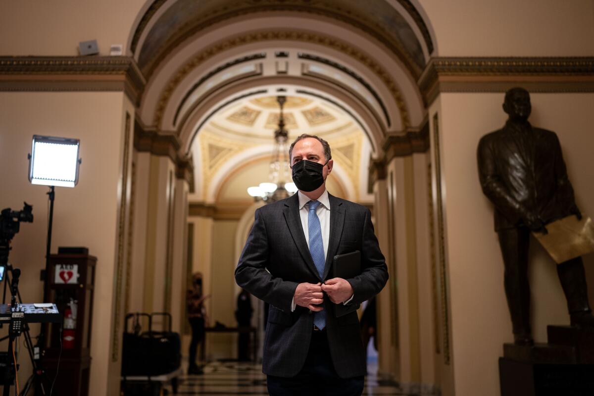 Rep. Adam Schiff walks out from the House chamber on Capitol Hill.