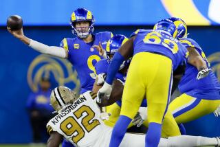 Los Angles Rams quarterback Matthew Stafford throws a pass.