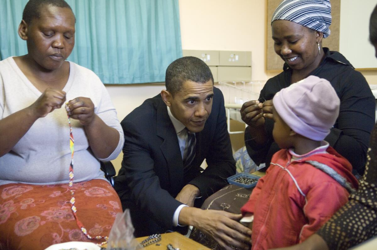 Sen. Barack Obama visits Khayelitsha, a poor township outside Cape Town, where he criticized the federal government's response to HIV/AIDS. He has donated $14,000 to an AIDS orphan facility in Kenya, where his African tour heads this week.