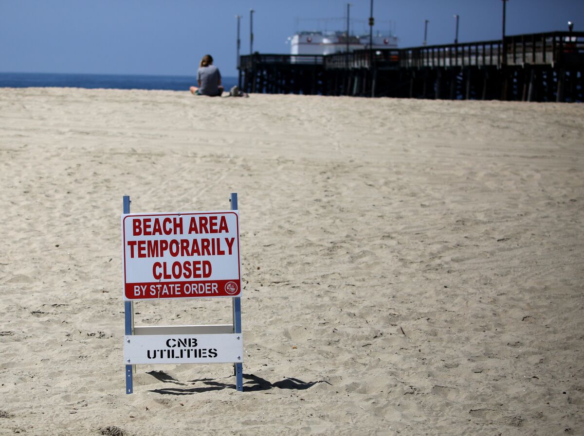 It was almost empty on the beach next to the closed Balboa Pier in Newport Beach on Saturday.