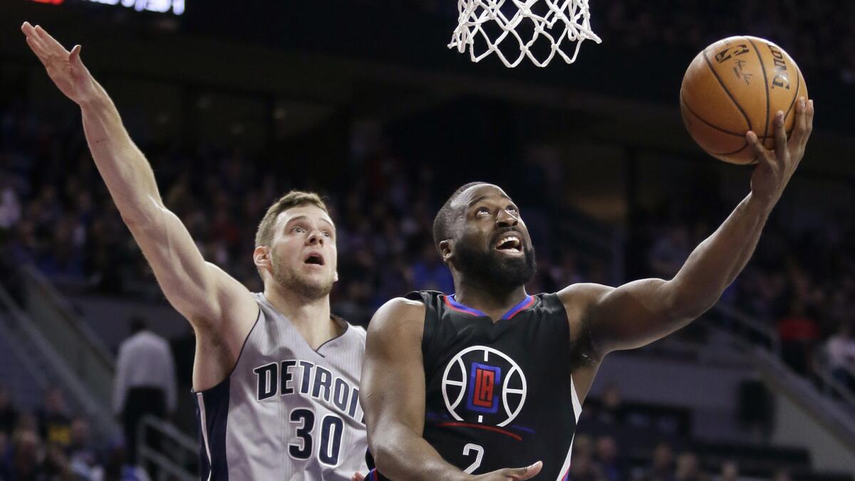 Clippers backup point guard Raymond Felton drives past Pistons forward Jon Leuer for a layup during their game on Nov. 25.