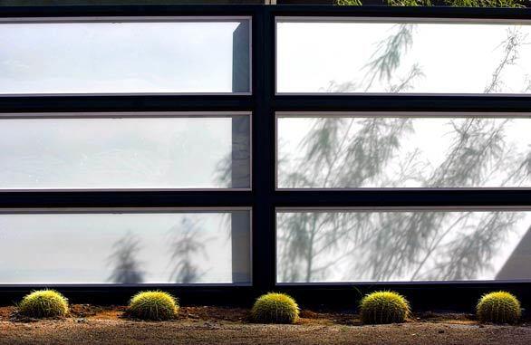 Some new owners of midcentury modern homes in Palm Springs are replacing more traditional landscapes with ultra-spare minimalist gardens of gravel or lawn, with geometric accents or rows of cactus or grasses.