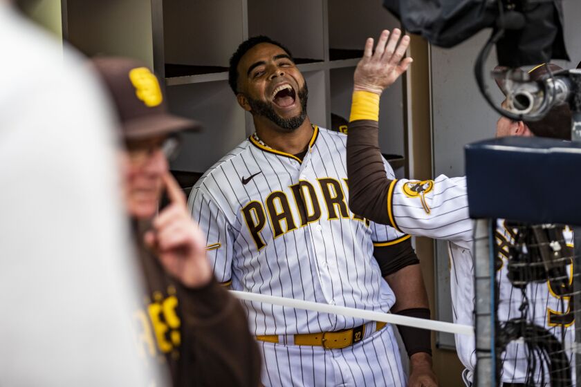 San Diego, CA - April 13: Padres' Nelson Cruz laughs in the dugout before their game against the Brewers at Petco Park on Thursday, April 13, 2023 in San Diego, CA. (Meg McLaughlin / The San Diego Union-Tribune)