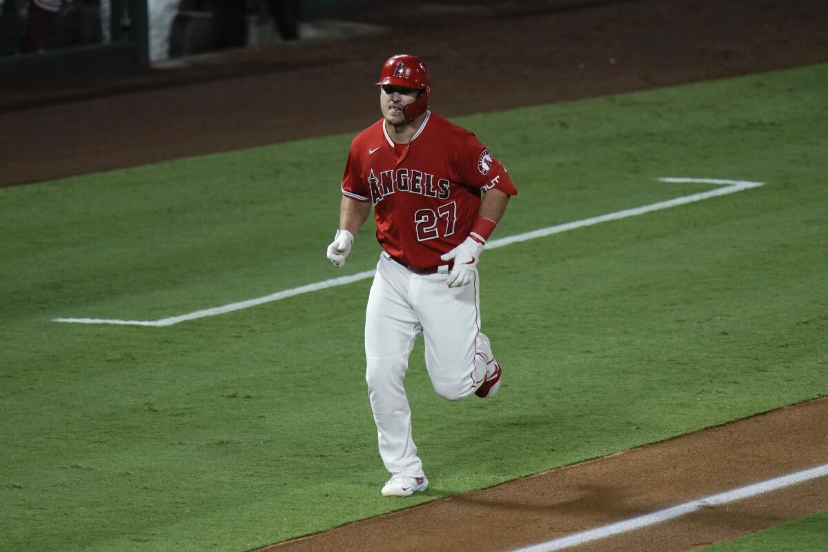 Angels' Mike Trout rounds the bases after hitting a two-run home run against the San Diego Padres on Sept. 2.