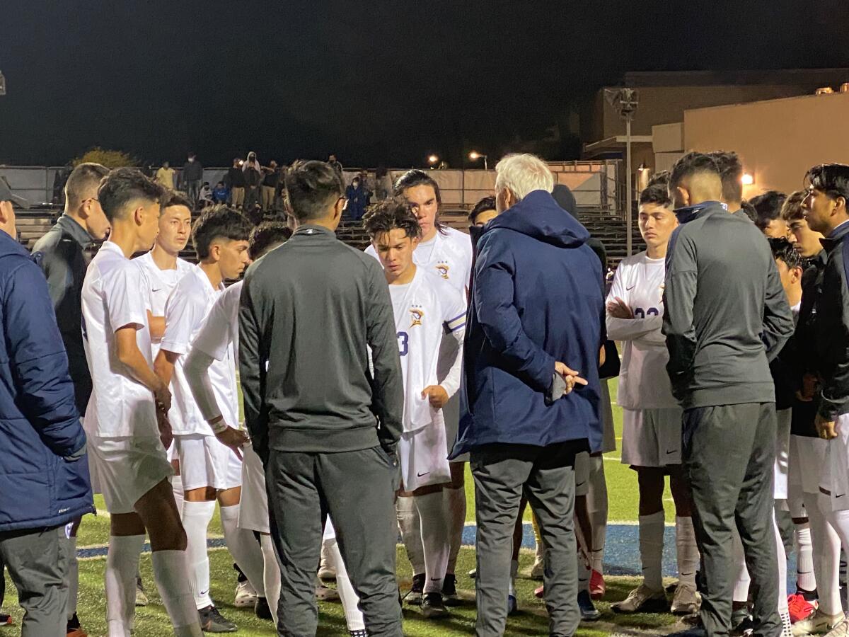 Birmingham soccer coach EB Madha talks to his team after 2-2 tie with El Camino Real.