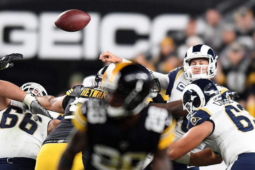 PITTSBURGH, PENNSYLVANIA NOVEMBER 10, 2019-Rams quarterback Jared Goff fumbles the ball as he is hit by a Steelers defender at Heinz Field in Pittsburgh Sunday. Steelers scored a touchdown on the play. (Wally Skalij/Los Angerles Times)