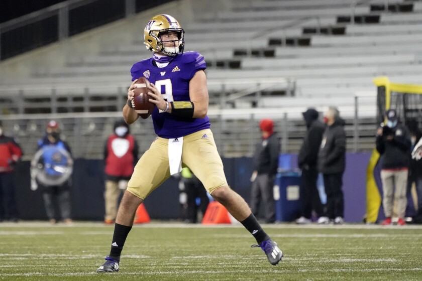 Washington quarterback Dylan Morris drops back to pass against Utah during the second half of an NCAA college football game Saturday, Nov. 28, 2020, in Seattle. (AP Photo/Ted S. Warren)