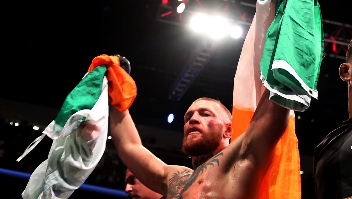 Conor McGregor celebrates after defeating Nate Diaz in their rematch at UFC 202 on Aug. 20.