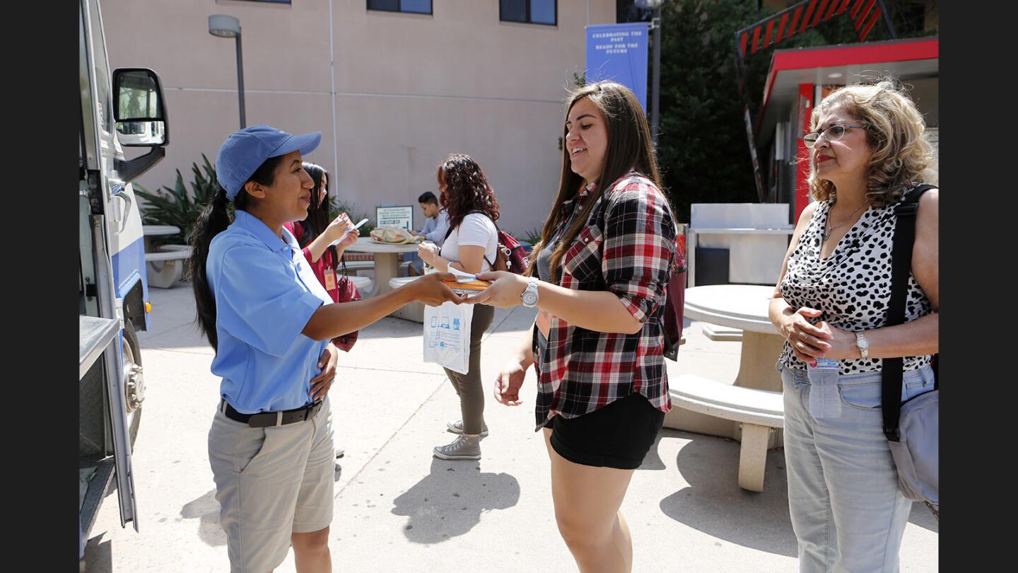 Photo Gallery: Helpful Honda ice cream truck gave away free ice cream at Glendale Community College