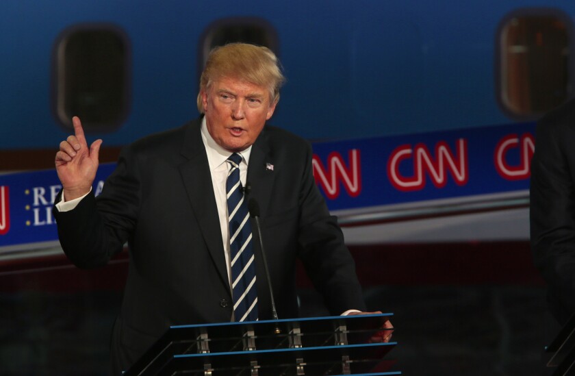 Then-candidate Donald Trump speaks during a debate at the Ronald Library in Simi Valley on Sept. 16, 2015.