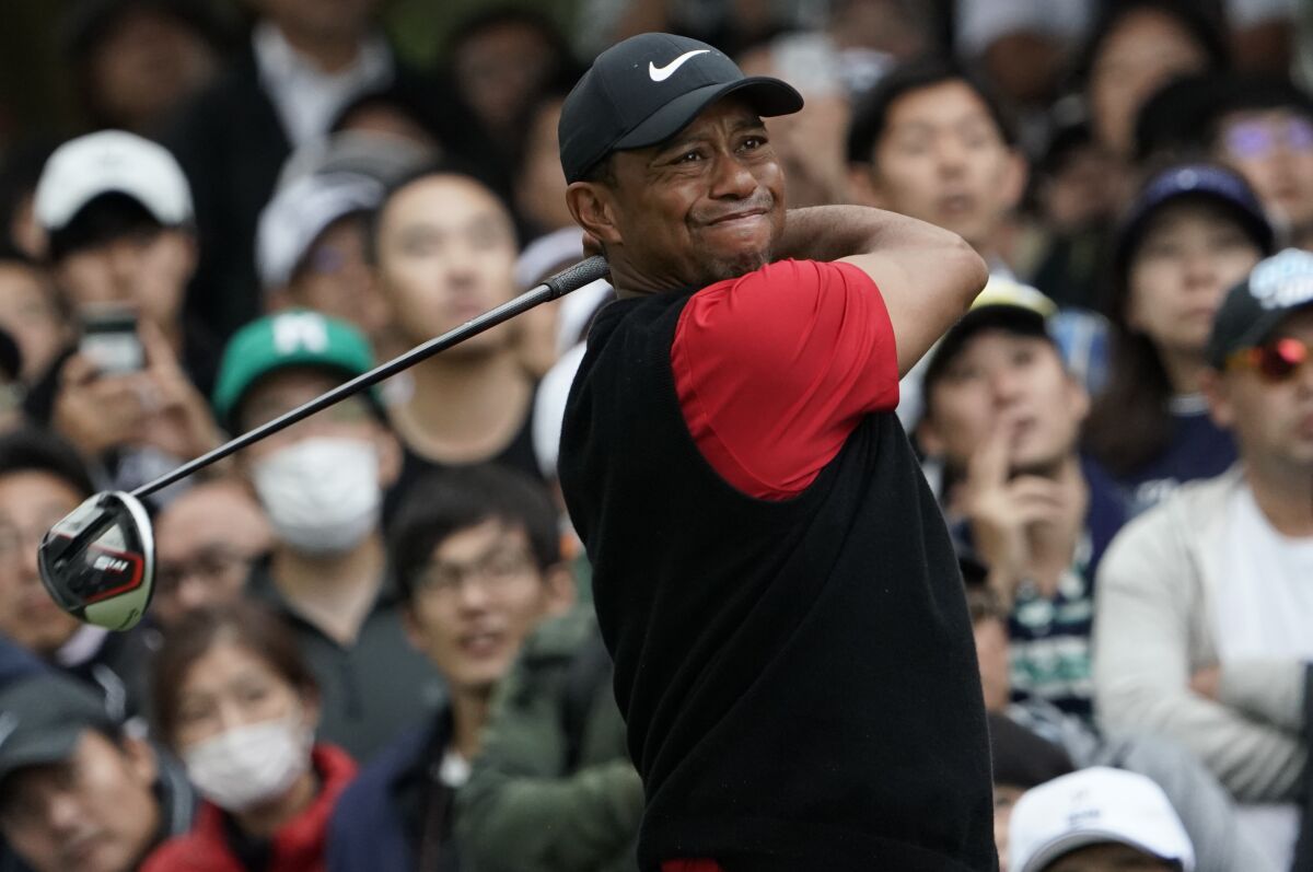 Tiger Woods watches his tee shot at the sixth hole during the final round of the Zozo Championship at the Accordia Golf Narashino Country Club on Oct. 27, 2019.