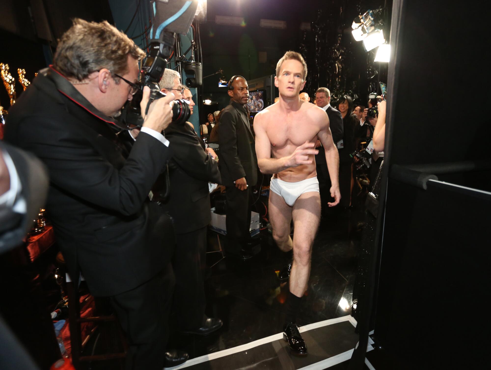 2015: Neil Patrick Harris heads onstage in his tighty whities