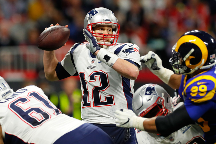 ATLANTA, GA - FEBRUARY 03: Tom Brady #12 of the New England Patriots thorws a pass.
