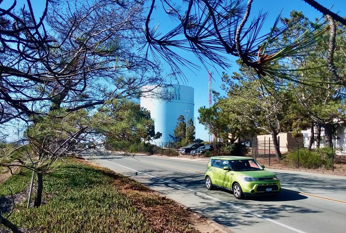 One radio mast southeast of the water tower marks the former home of NPL at Naval Base Point Loma.