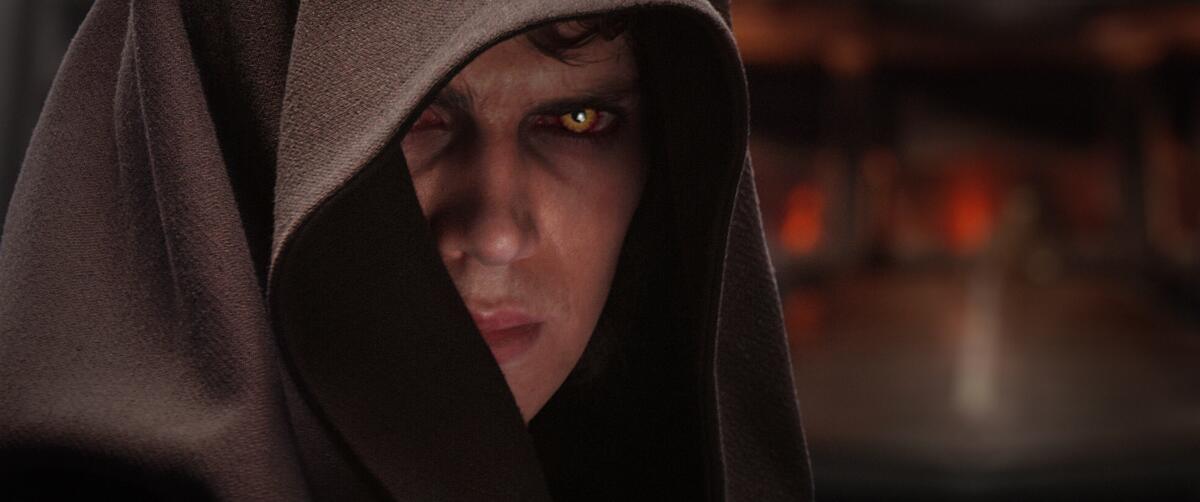 Hayden Christensen as Anakin Skywalker in a close-up frame of his face 