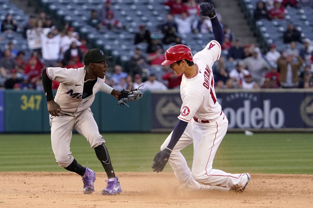 Miami Marlins second baseman Jazz Chisholm Jr. reacts after tagging out Angels' Shohei Ohtani who was trying to steal second.