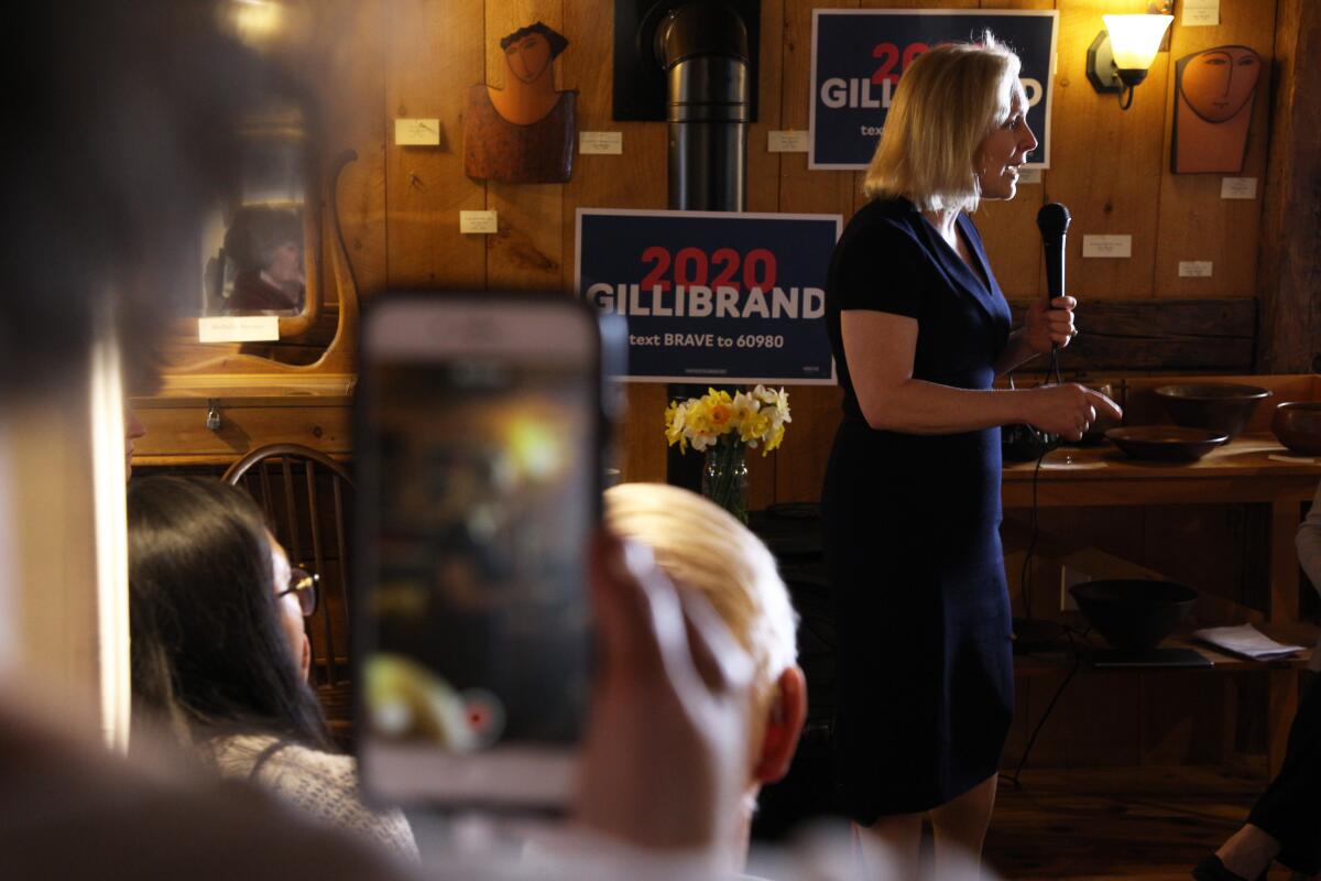 Cheri Shmitt records presidential candidate Kirsten Gillibrand speaking at a bookstore in Warner, N.H.