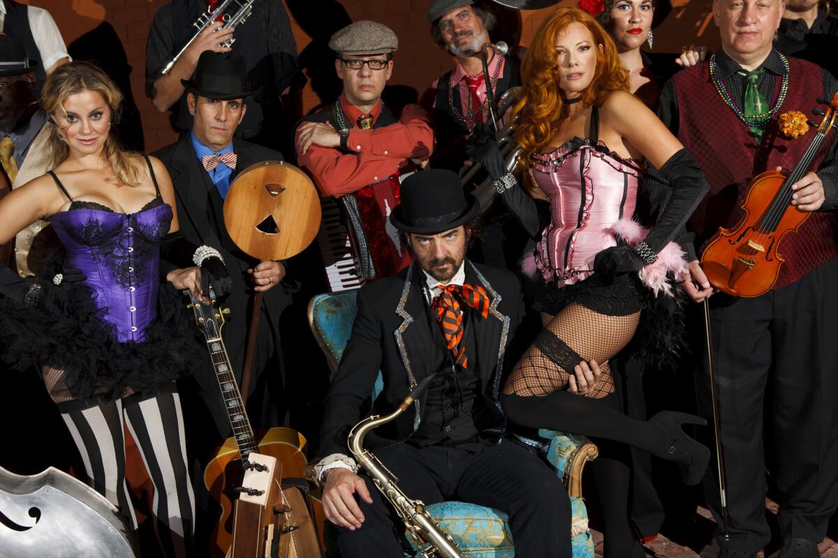 Andy Comeau (a.k.a. Vaud Overstreet), seated center, and his band Vaud & the Villains have been playing an increasing number of performances outside the Southland. Friday night, though, they'll be at the Ford Amphitheatre in Hollywood.