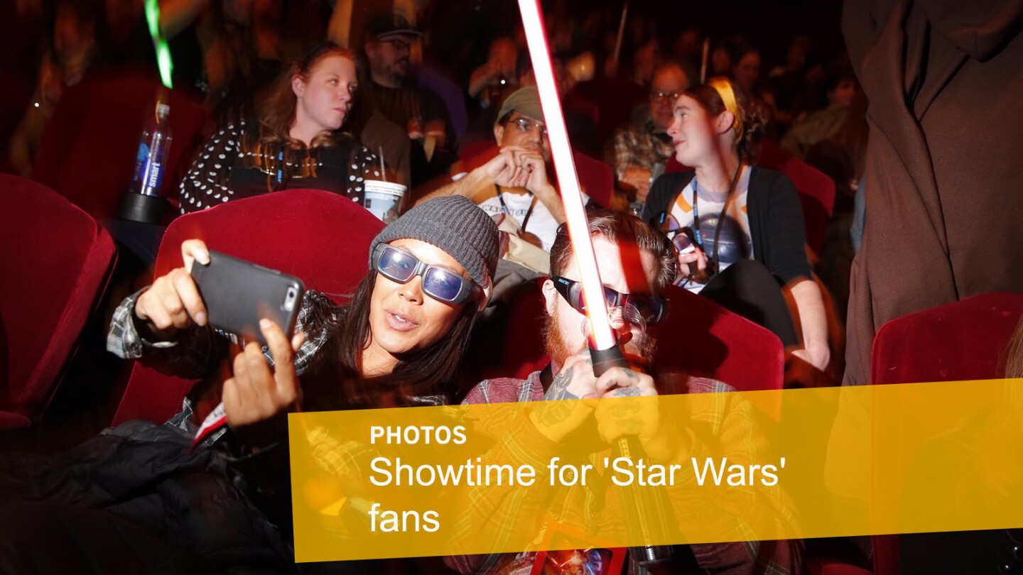 Scenes from the opening night of "Star Wars: The Force Awakens": Fans wait for the start of the movie at the TCL Chinese Theatre in Hollywood.