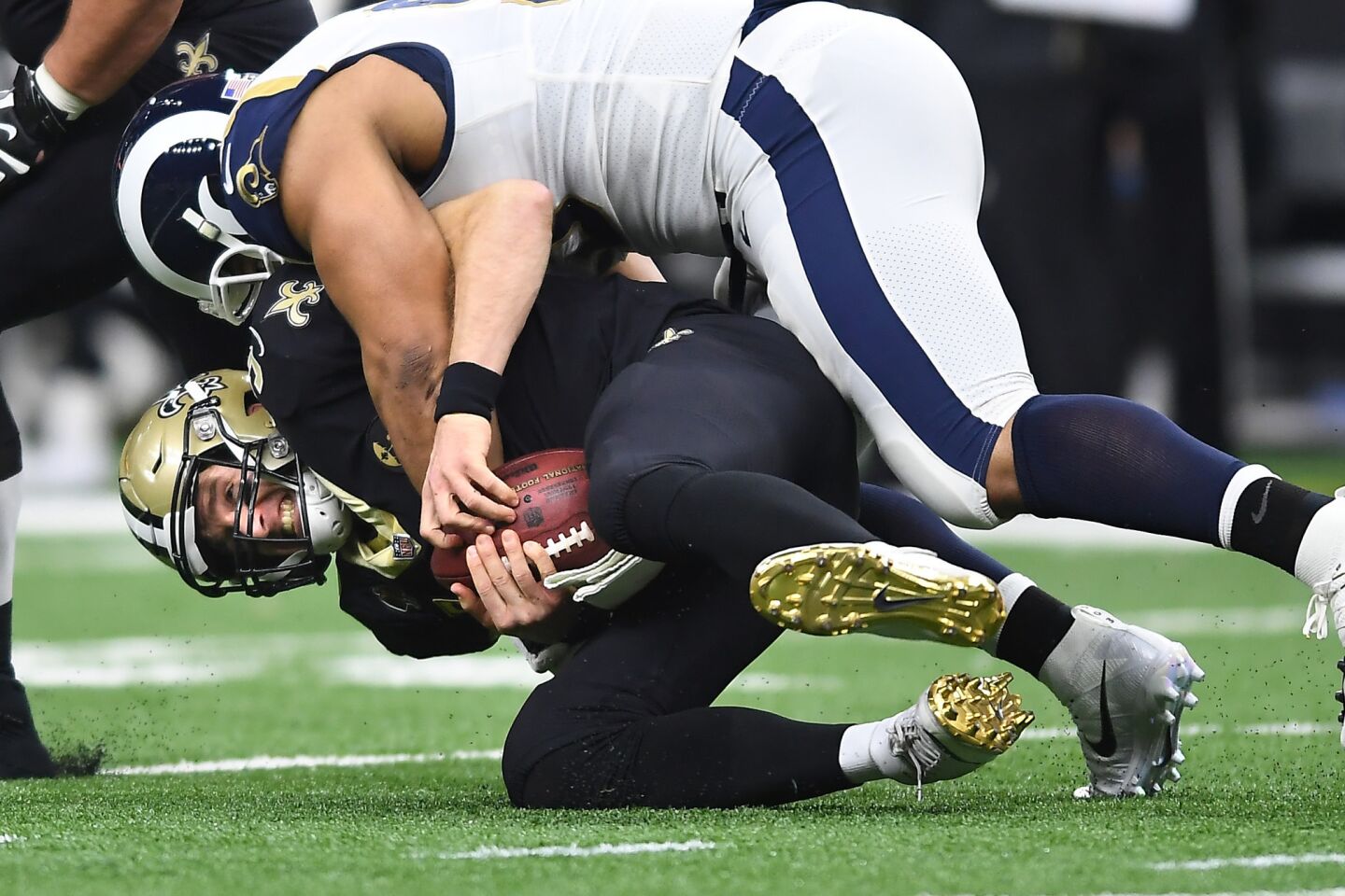 Rams defensive lineman Ndamukong Suh sacks Saints quarterback Drew Brees in the second quarter in the NFC Championship at the Superdome on Jan. 20.
