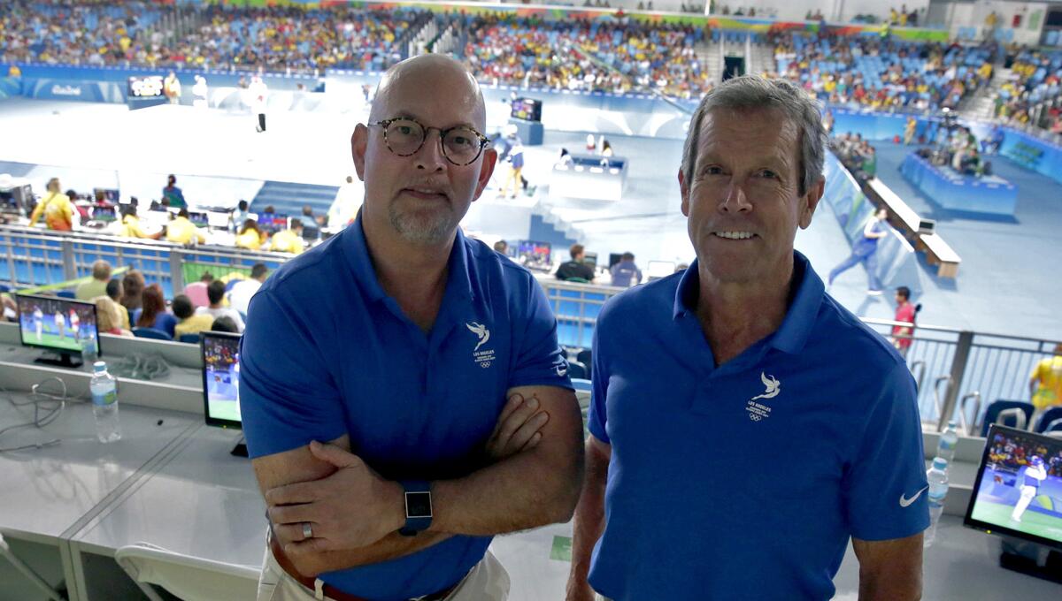 Bill Hanway, left and Doug Arnot work behind the scenes at the Rio Olympics to try to deliver the Summer Games to L.A. in 2024.