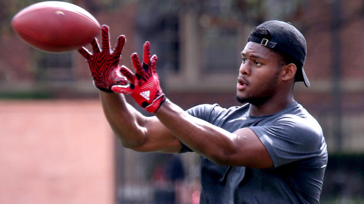 JuJu Smith-Schuster makes a catch during his workout at USC's pro day on Wednesday.