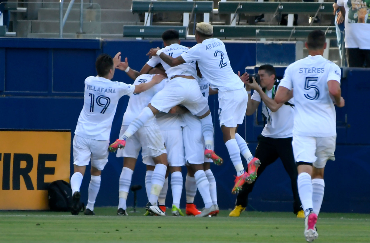 The Galaxy celebrate after Javier “Chicharito” Hernández scored in the 11th minute May 8, 2021.