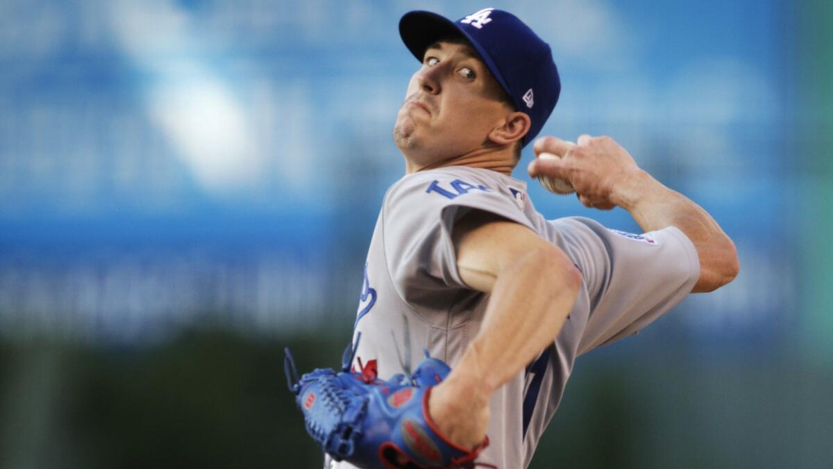 Dodgers starter Walker Buehler struck out six, scattered four hits and survived three walks in seven innings against Colorado.