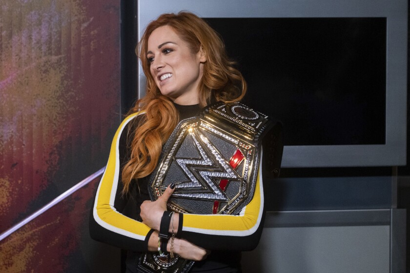FILE - WWE Superstar Becky Lynch visits the Empire State Building to promote WrestleMania 35 on Friday, April 5, 2019, in New York. Becky Lynch defends her WWE Raw women's championship in one of the marquee matches Saturday, Jan. 29, 2022, in WWE's Royal Rumble at The Dome in St. Louis, Missouri. (Photo by Charles Sykes/Invision/AP, File)