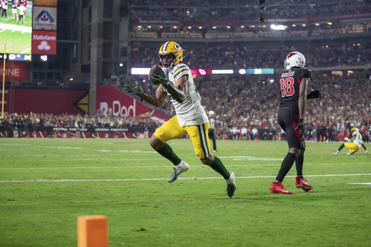 Green Bay Packers cornerback Rasul Douglas intercepts a pass near the end of the game.