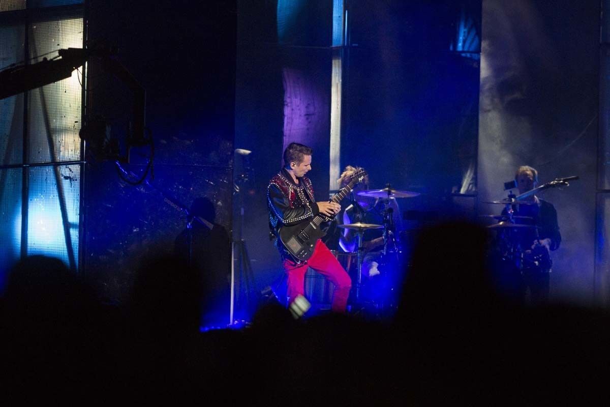 Muse lead singer Matt Bellamy performs on the Grandview Stage on Saturday evening.