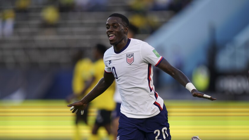 The United States' Tim Weah celebrates after scoring against Jamaica