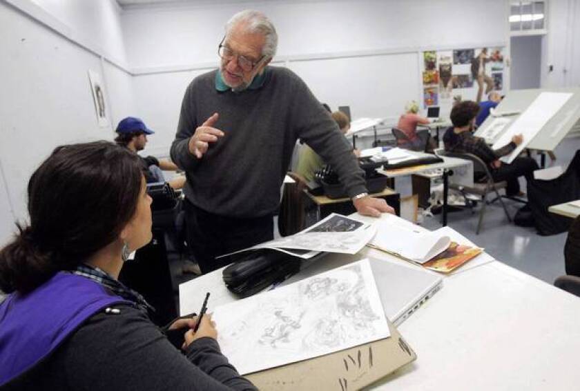 Joe Kubert advises art student Sian Mandrak while teaching a class at the Kubert School in Dover, N.J., in 2010.